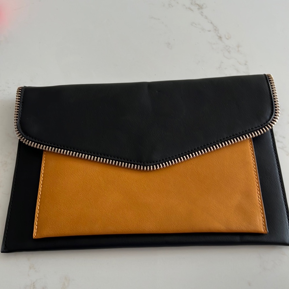 Neiman Marcus brand leather clutch